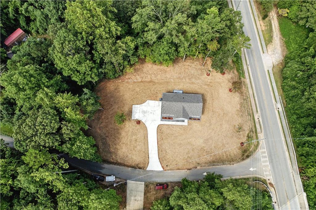 194 Harris Loop Dallas, GA 30157 - Photo 24 of 25 an aerial view of a house with a yard and fountain