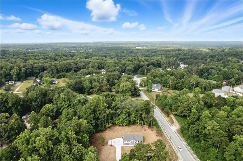194 Harris Loop Dallas, GA 30157 - Photo 25 of 25 an aerial view of residential houses with outdoor space and trees