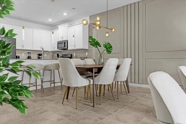 a view of a dining room with furniture