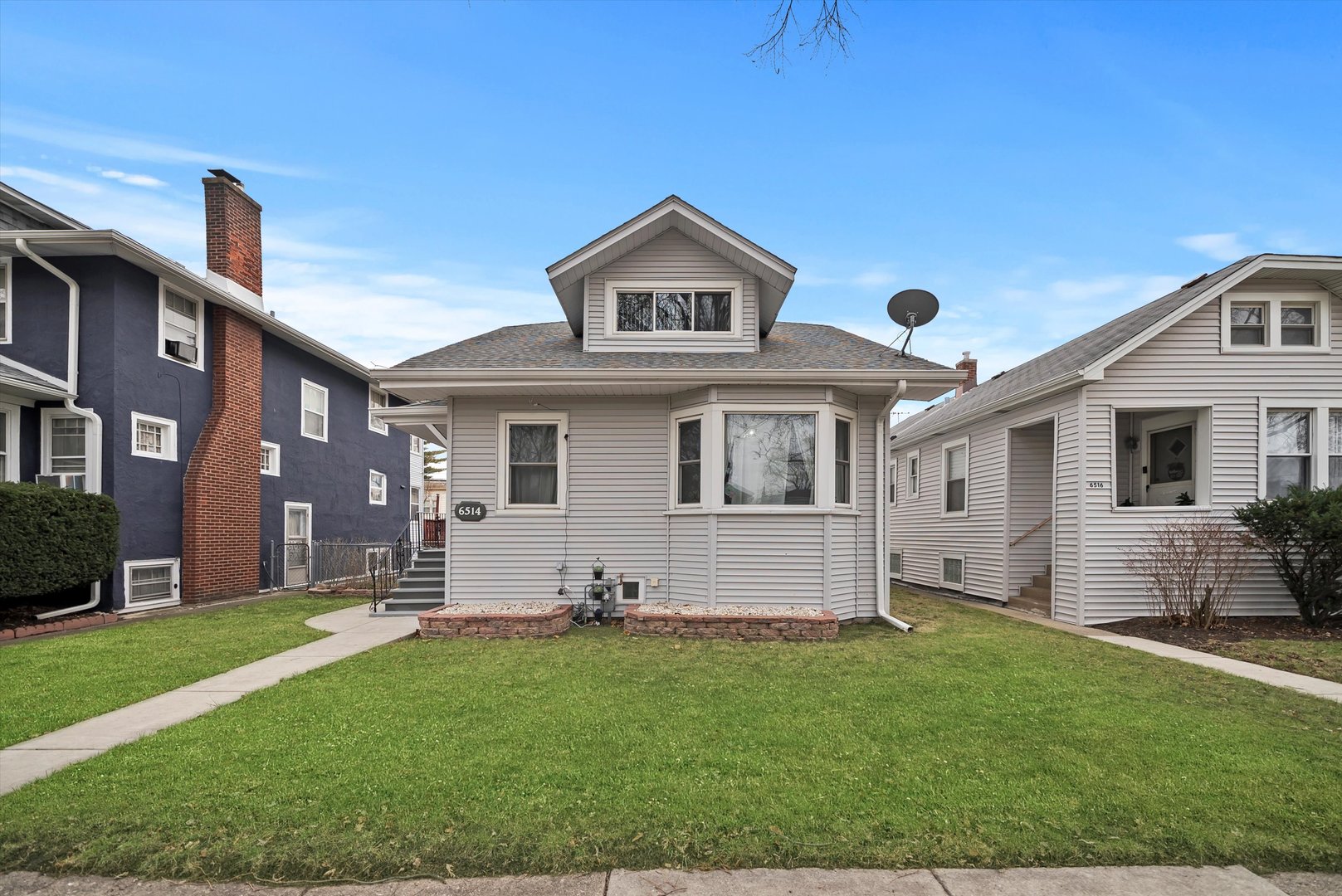 6514 Sinclair Avenue Berwyn, IL 60402 - Photo 1 of 33 a view of a house with a yard and plants