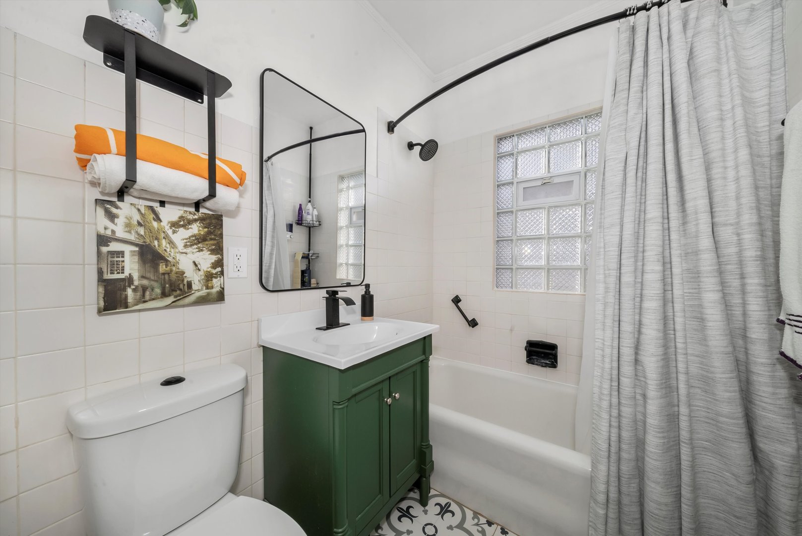 6514 Sinclair Avenue Berwyn, IL 60402 - Photo 14 of 33 a bathroom with a sink a toilet and shower