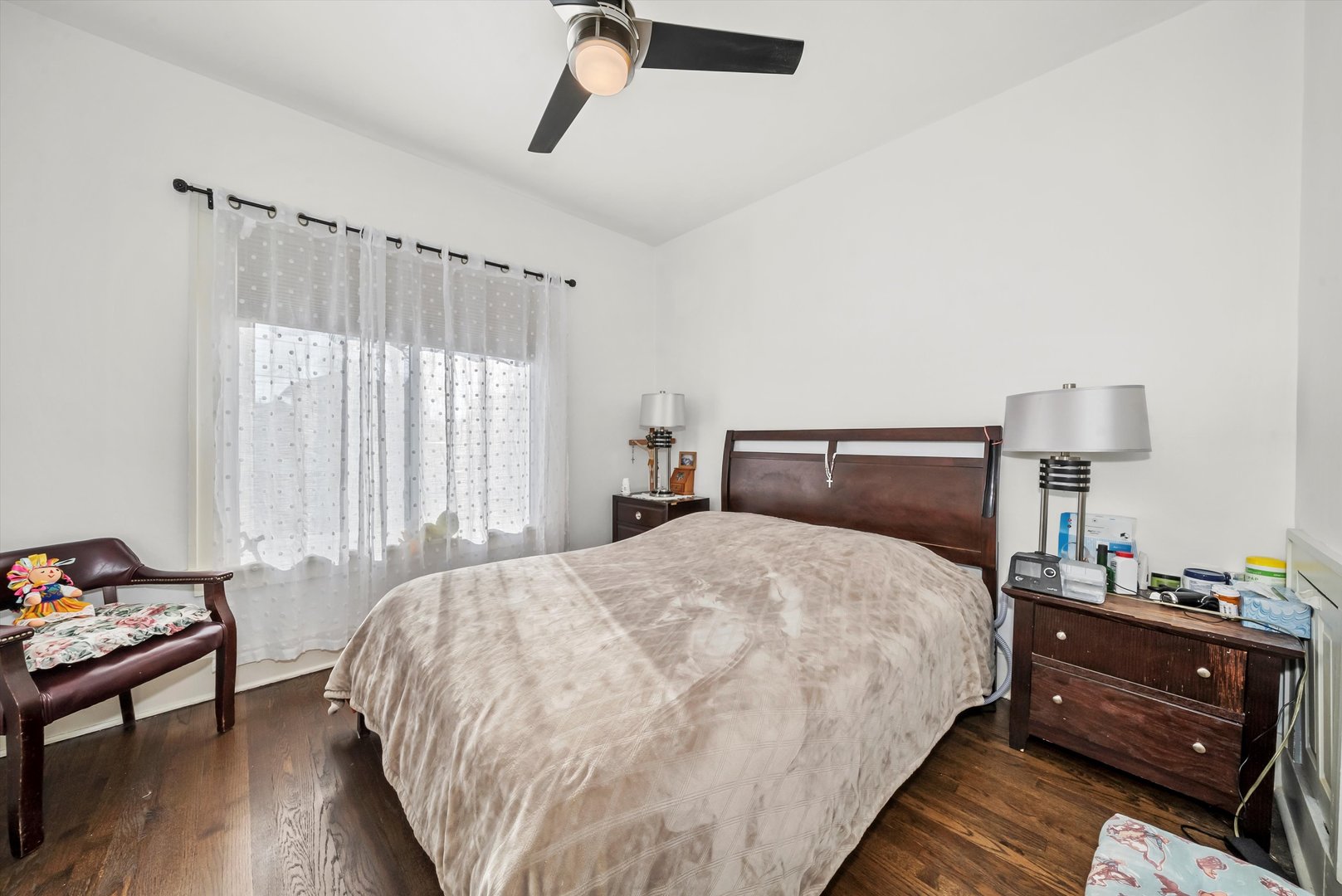 6514 Sinclair Avenue Berwyn, IL 60402 - Photo 15 of 33 a bedroom with a bed and wooden floor