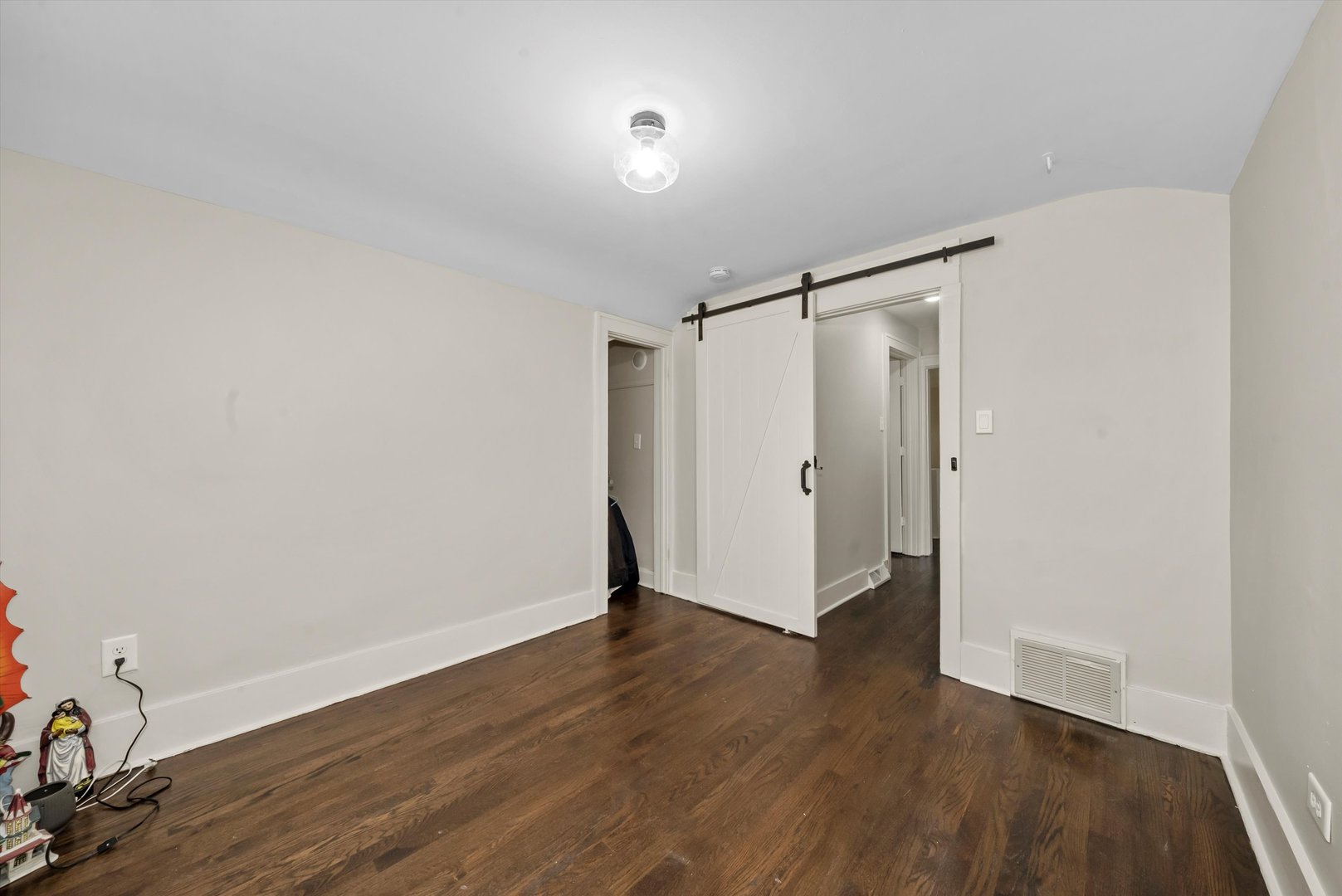 6514 Sinclair Avenue Berwyn, IL 60402 - Photo 16 of 33 a view of an empty room with wooden floor