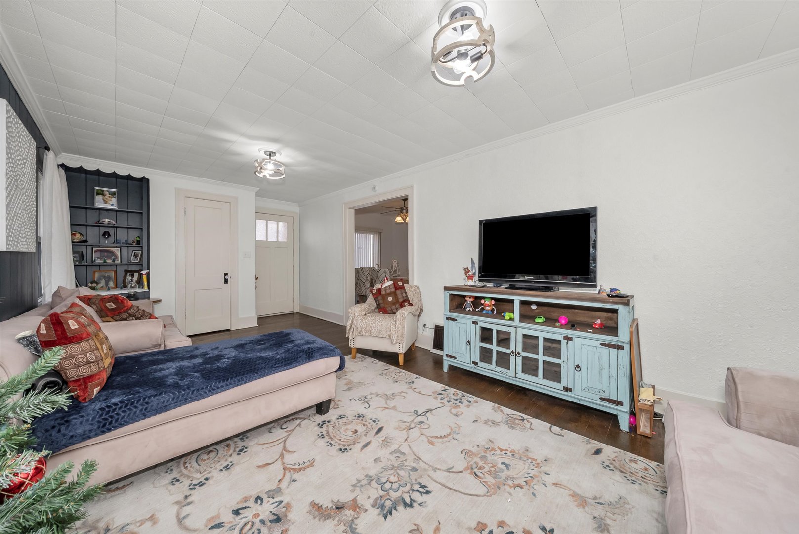 6514 Sinclair Avenue Berwyn, IL 60402 - Photo 2 of 33 a bedroom with furniture and a flat screen tv