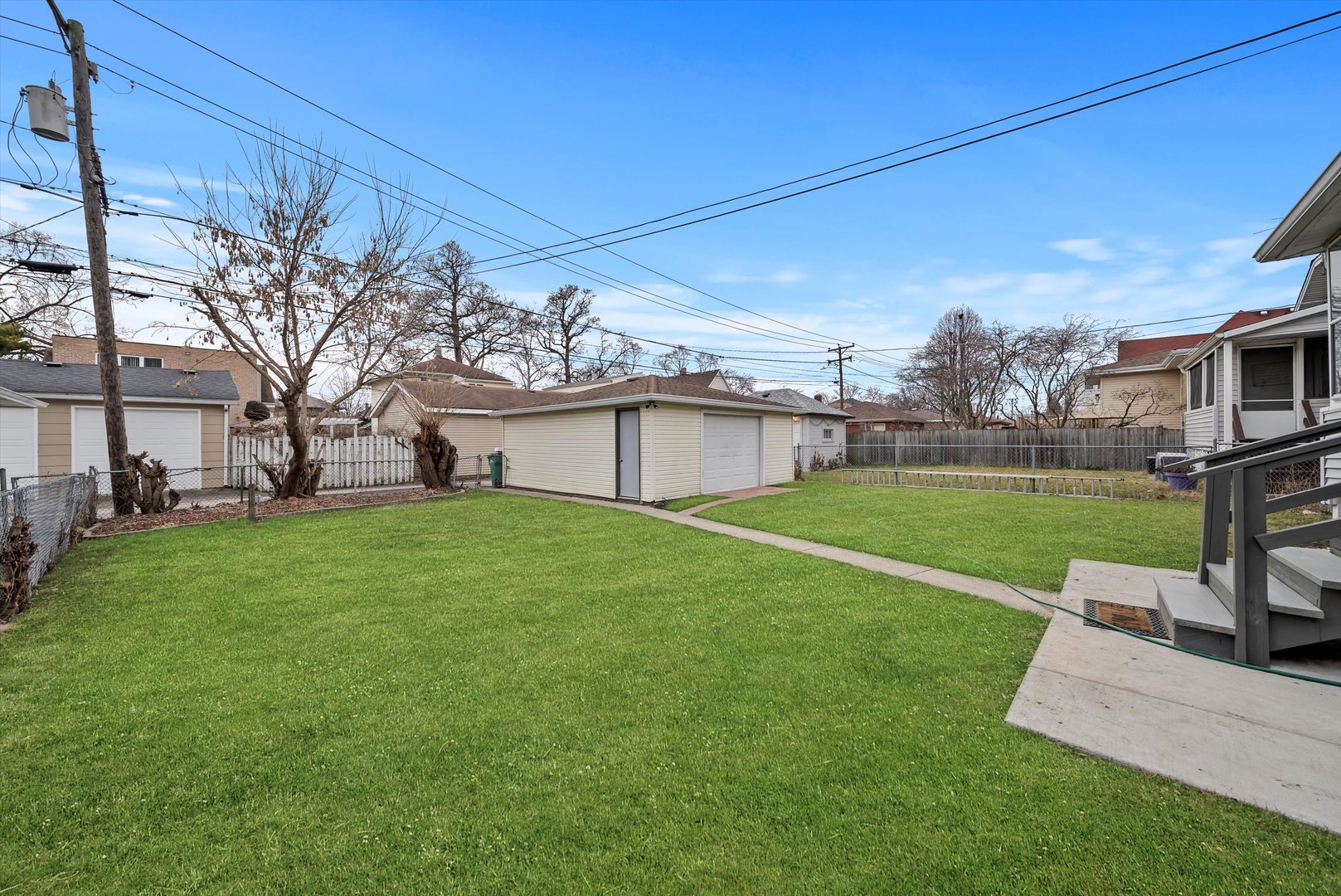 6514 Sinclair Avenue Berwyn, IL 60402 - Photo 26 of 33 a view of a house with a big yard