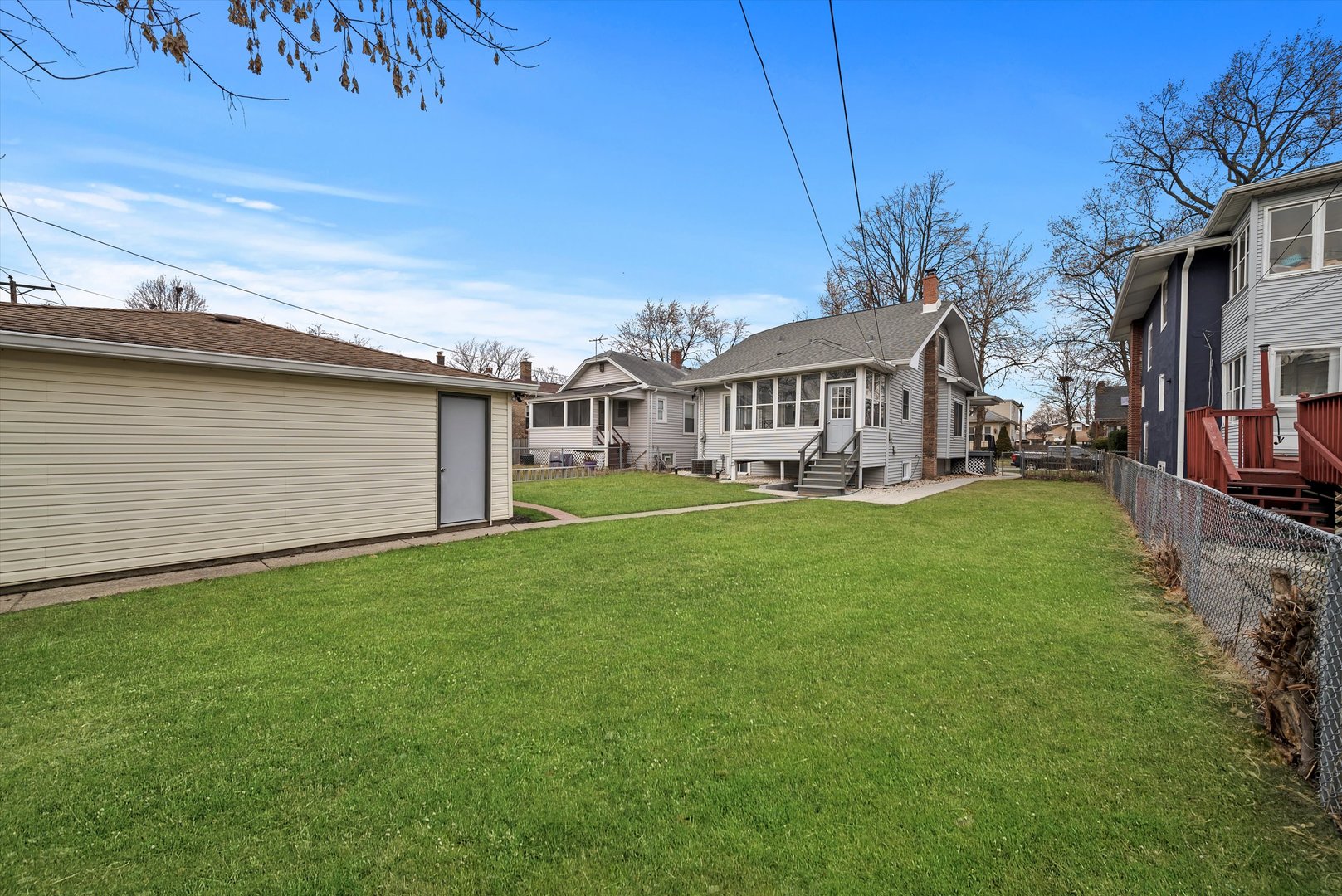 6514 Sinclair Avenue Berwyn, IL 60402 - Photo 28 of 33 a view of an house with backyard space and balcony