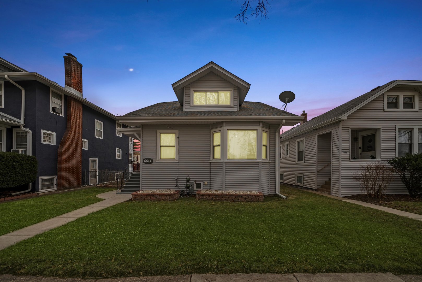 6514 Sinclair Avenue Berwyn, IL 60402 - Photo 33 of 33 a front view of a house with a yard
