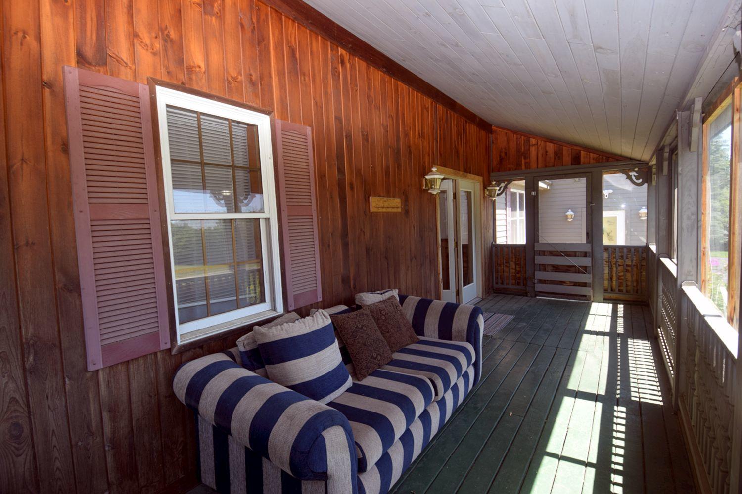 110 Patterson Bridge Road North Anson, ME 04958 - Photo 11 of 94 Screened porch 2
