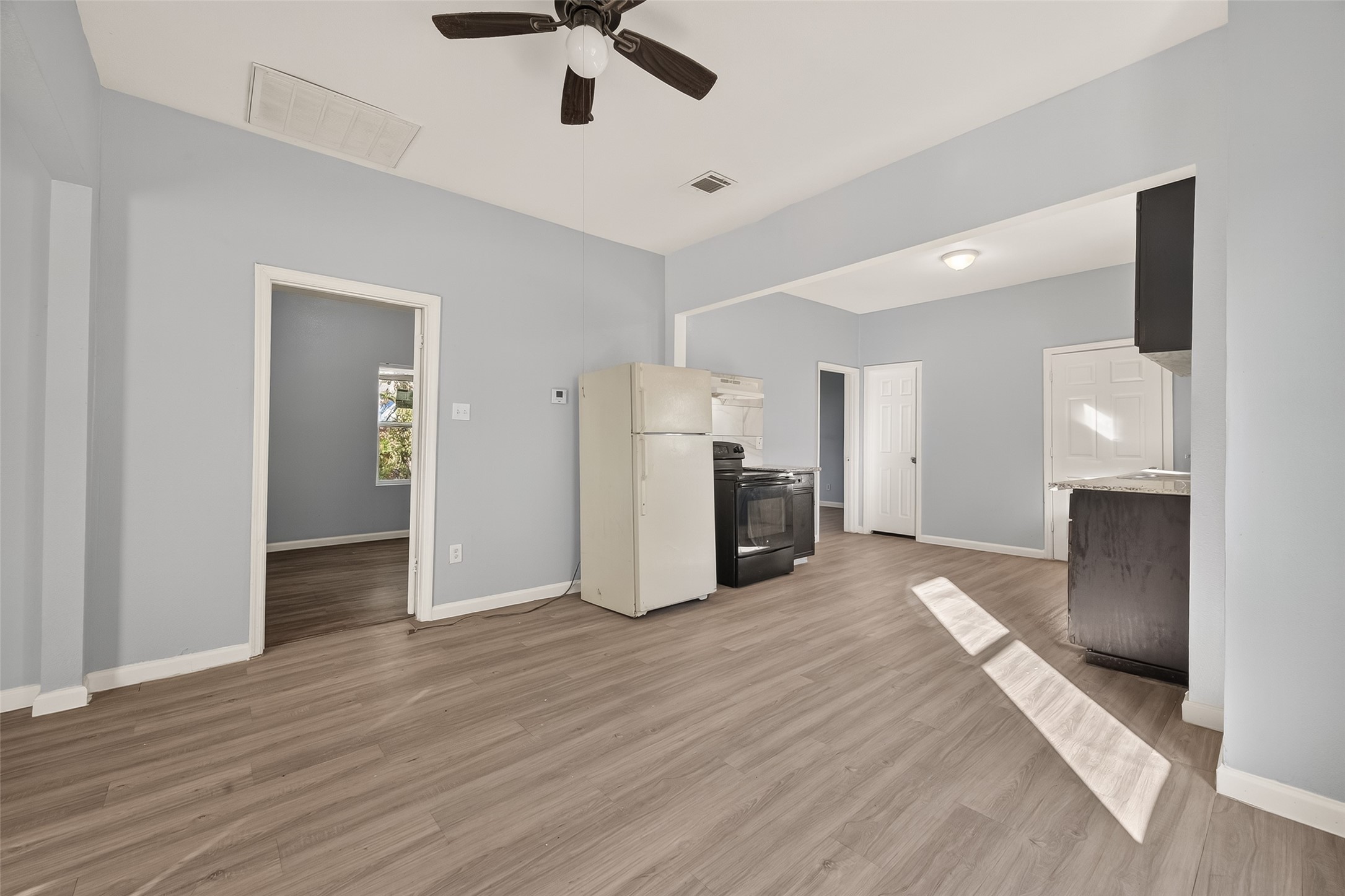 8211 Parnell Street Houston, TX 77051 - Photo 4 of 22 a view of kitchen and utility room