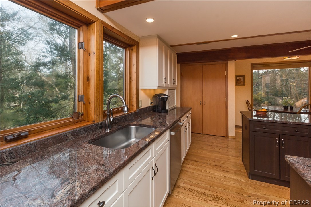 297 Cove Colony Road Lancaster, VA 22503 - Photo 6 of 50 a kitchen with a sink and large window