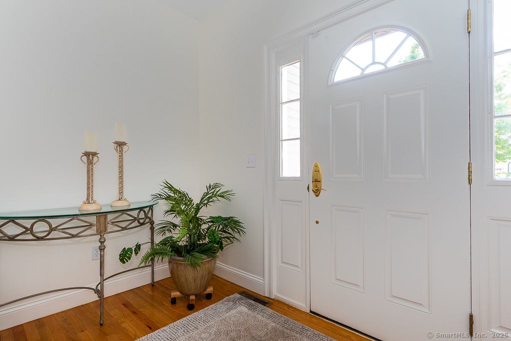 175 Ferry Road, Unit 3 Old Saybrook, CT 06475 - Photo 3 of 37 a view of entryway with wooden floor