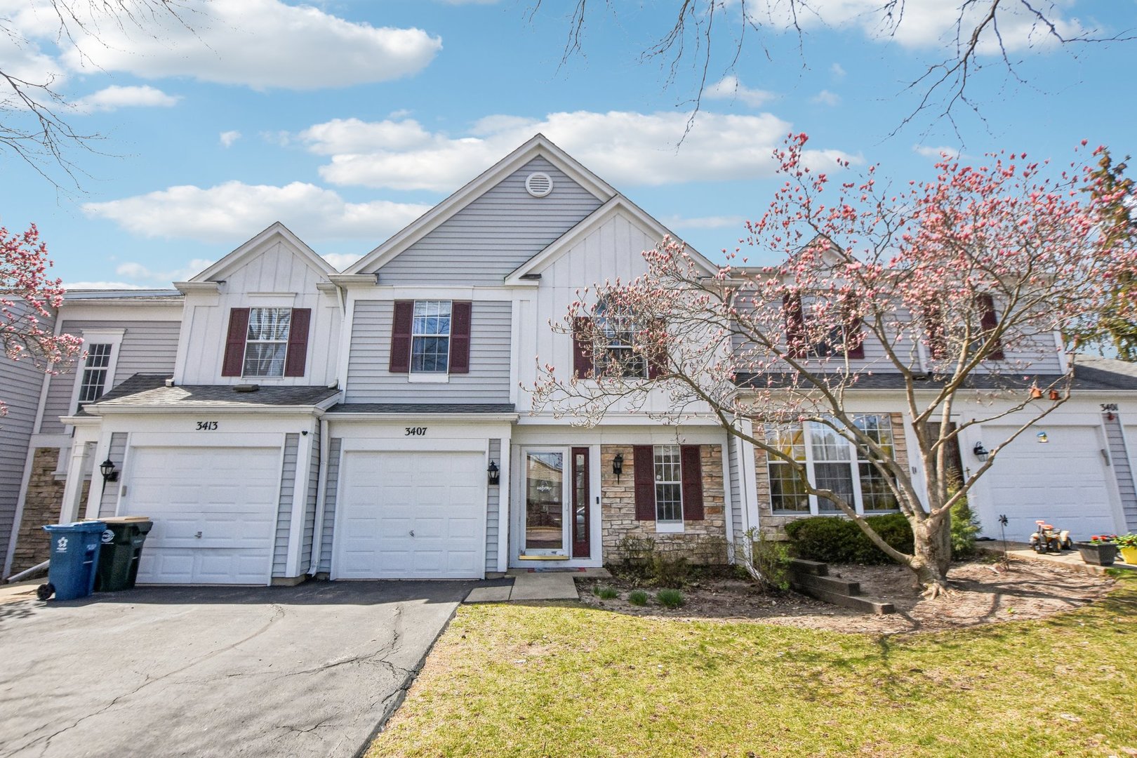 3407 Sandpiper Drive Aurora, IL 60504 - Photo 1 of 20 a front view of a house with garden