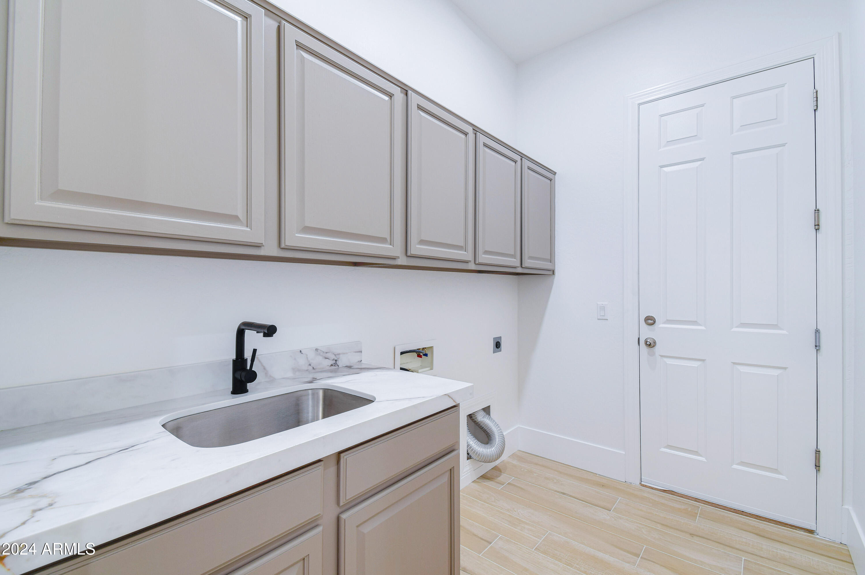 1270 East Baranca Road Gilbert, AZ 85297 - Photo 48 of 51 Laundry w Storage and Sink!