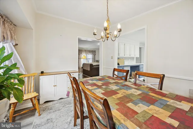 a bedroom with a bed and a table