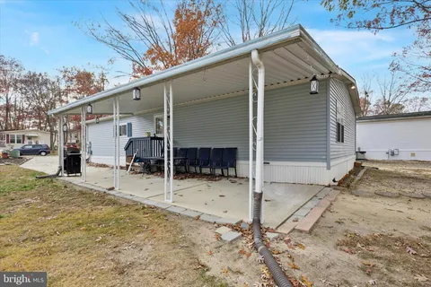 a view of a house with a patio