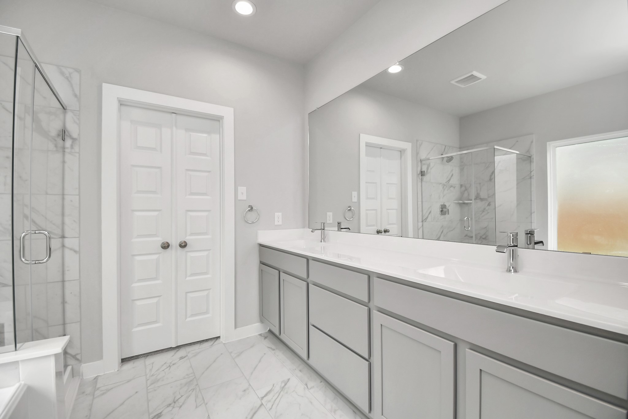 11106 Crocus Drive Houston, TX 77044 - Photo 7 of 40 a bathroom with a double vanity sink mirror and