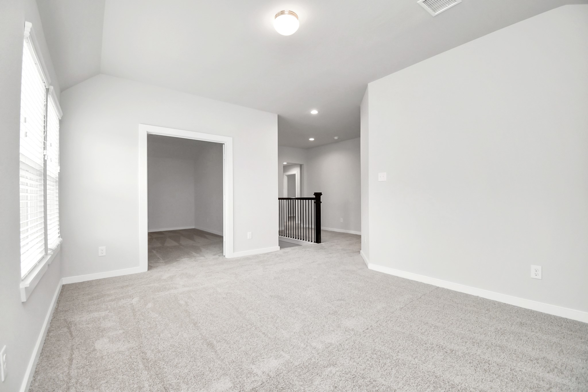 11106 Crocus Drive Houston, TX 77044 - Photo 33 of 40 an empty room with a window and a refrigerator