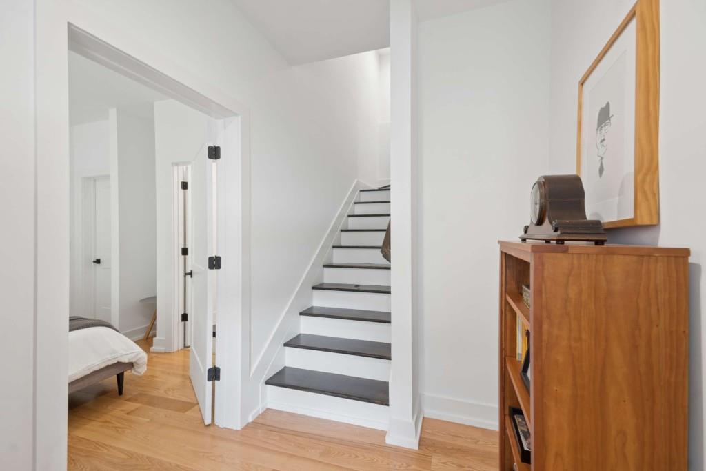 1105 Adam Circle Roswell, GA 30076 - Photo 29 of 34 a view of a hallway with entryway wooden floor and front door