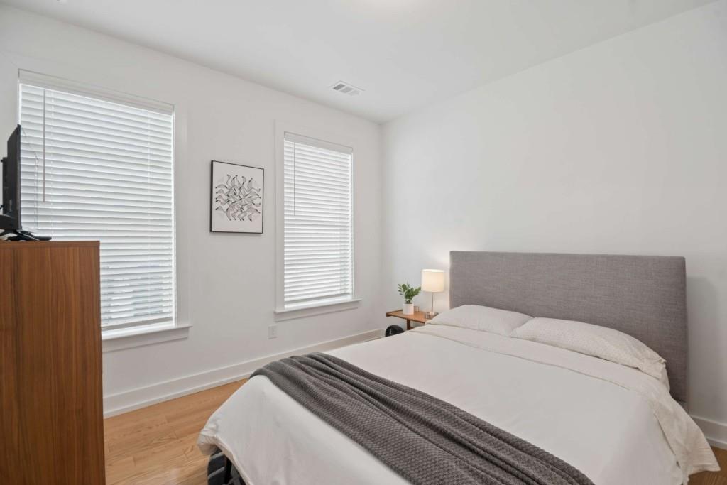 1105 Adam Circle Roswell, GA 30076 - Photo 30 of 34 a bedroom with a bed and a window
