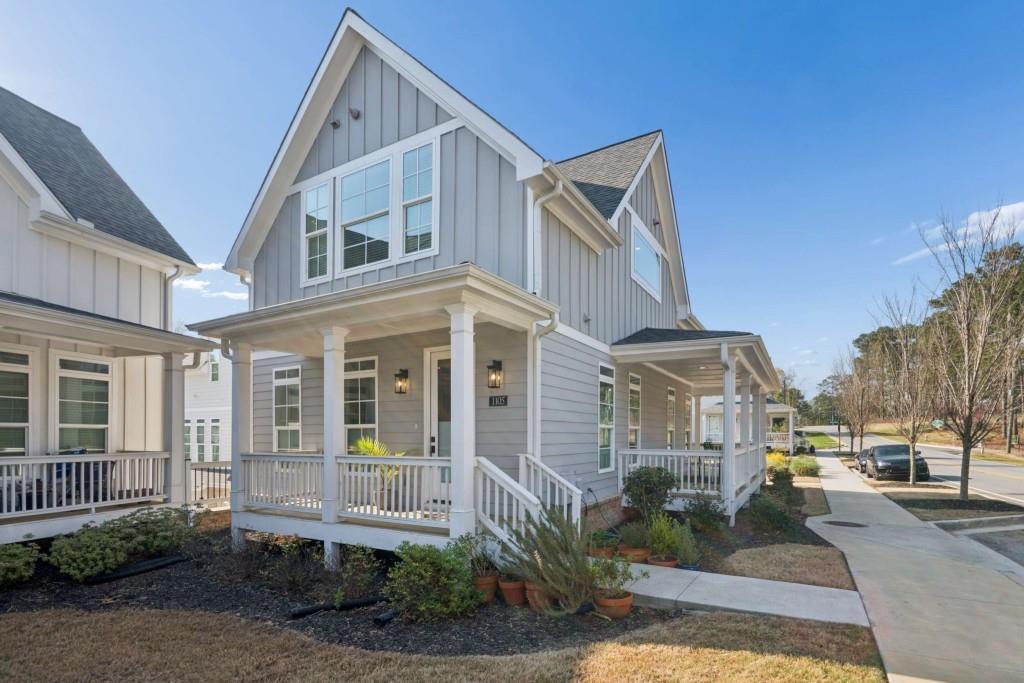 1105 Adam Circle Roswell, GA 30076 - Photo 6 of 34 a front view of a house with a yard