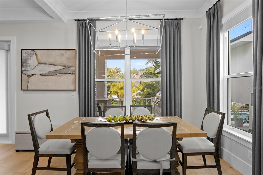 4807 West San Rafael Street Tampa, FL 33629 - Photo 12 of 64 a view of a dining room with furniture and a window