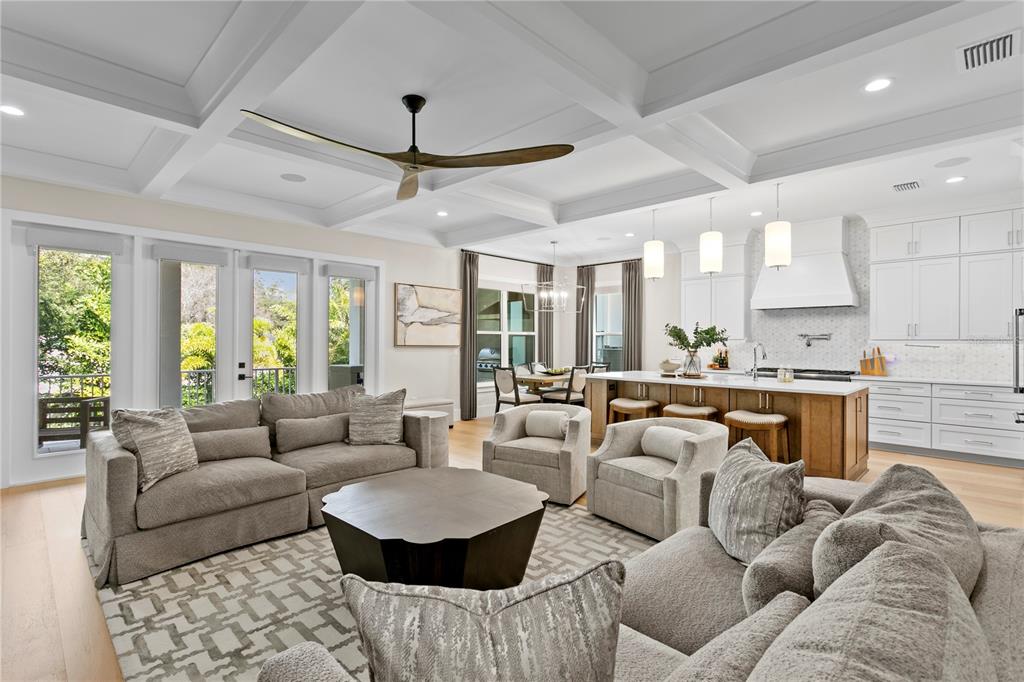 4807 West San Rafael Street Tampa, FL 33629 - Photo 16 of 64 a living room with furniture and a large window