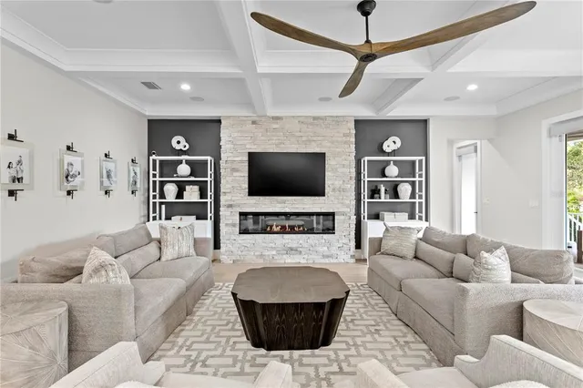 a spacious bedroom with a bed and a couch