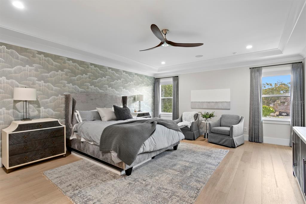 4807 West San Rafael Street Tampa, FL 33629 - Photo 20 of 64 a spacious bedroom with a bed and a couch