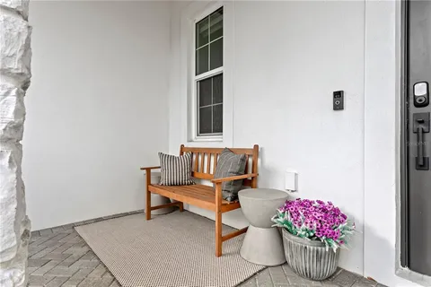 a room with furniture and flowers