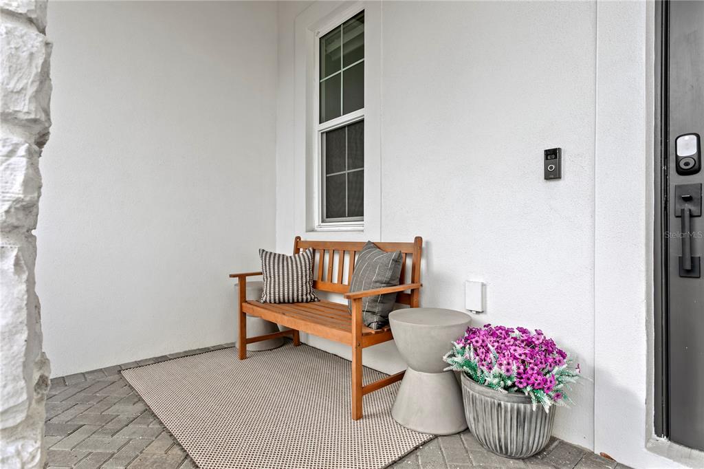 4807 West San Rafael Street Tampa, FL 33629 - Photo 2 of 64 a room with furniture and flowers