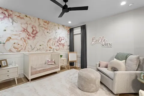 a kitchen with a stove and a potted plant