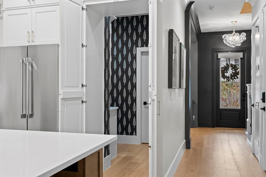 4807 West San Rafael Street Tampa, FL 33629 - Photo 8 of 64 a view of hallway with livingroom and stairs