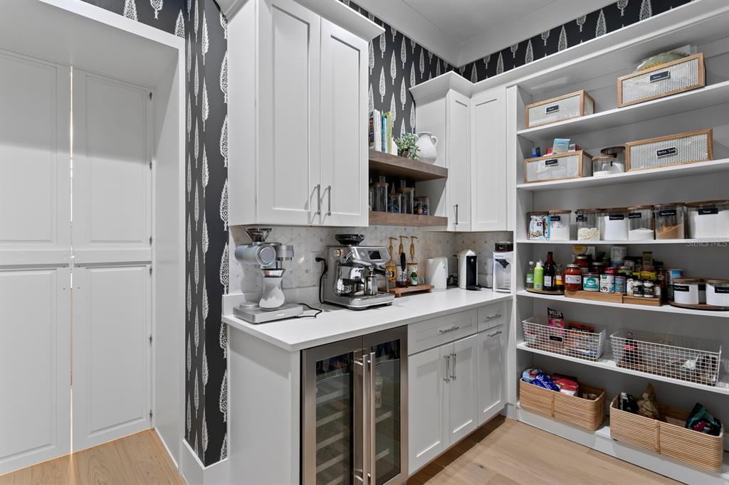 4807 West San Rafael Street Tampa, FL 33629 - Photo 10 of 64 a kitchen with stainless steel appliances granite countertop a sink and cabinets