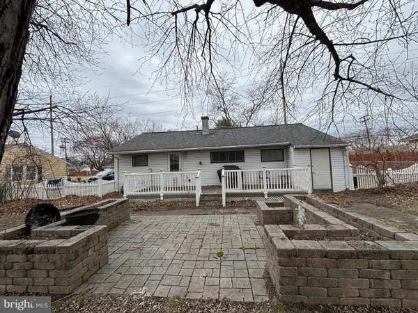 a front view of a house with parking space