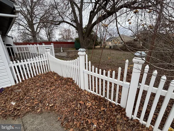 a view of a wooden fence