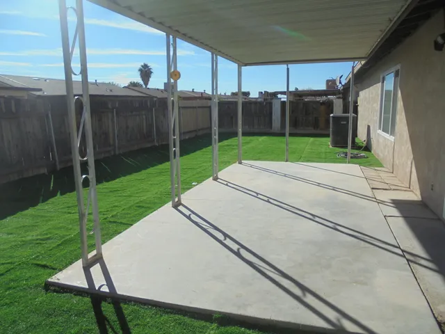 a view of a room with a fireplace