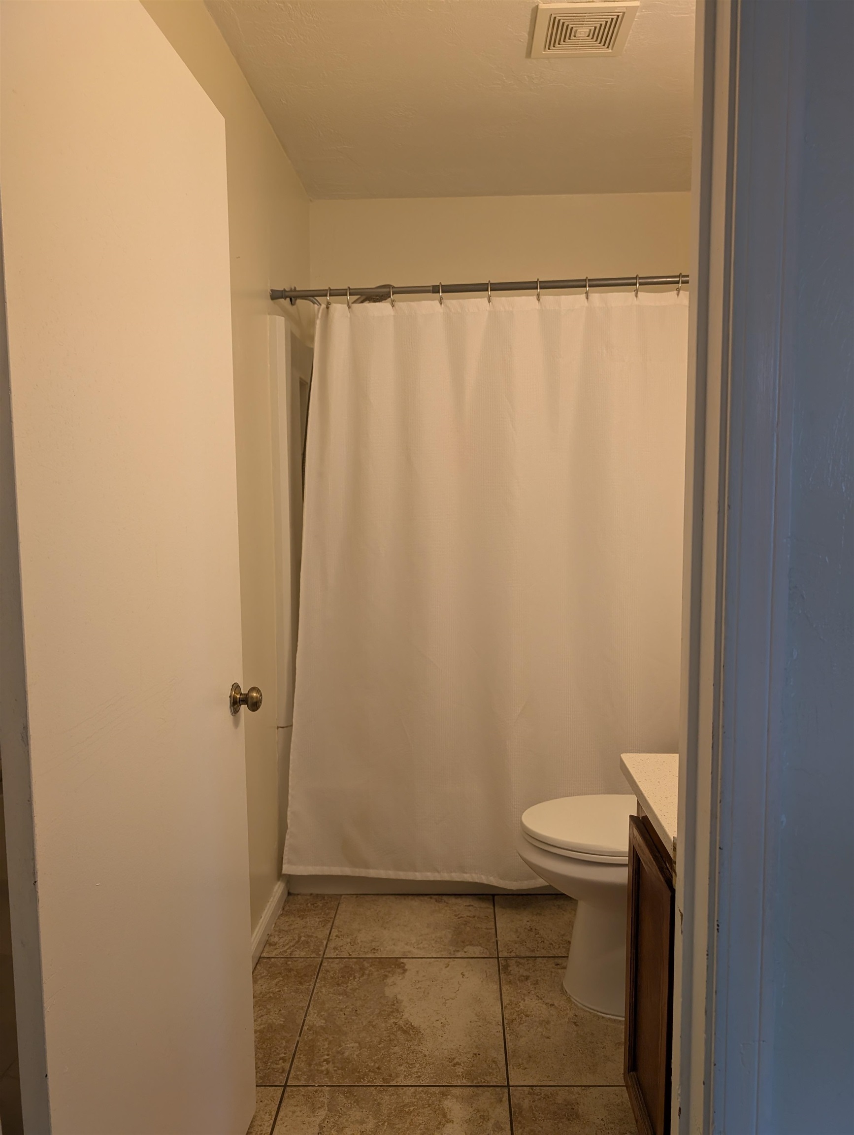 3885 Osprey Circle, Unit D St. Augustine, FL 32086 - Photo 5 of 12 Bathroom featuring vanity, a shower with curtain, and light tile patterned floors