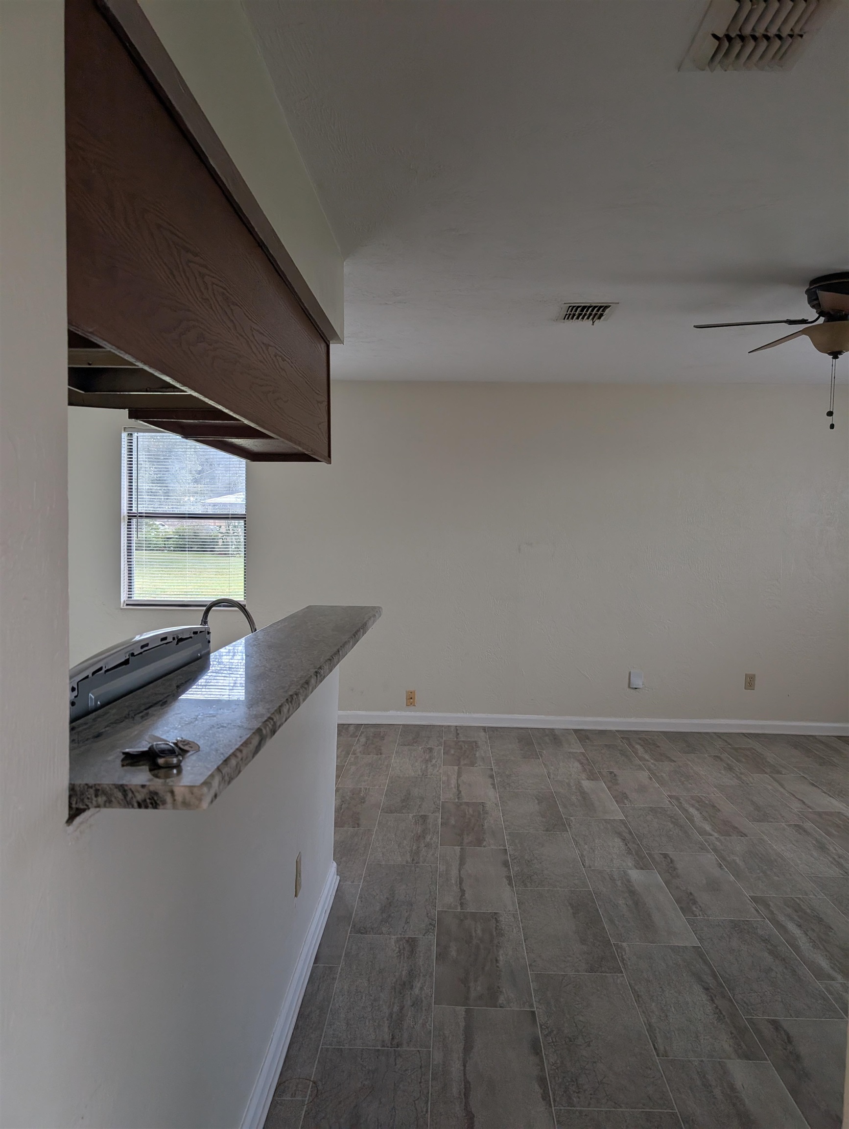 3885 Osprey Circle, Unit D St. Augustine, FL 32086 - Photo 6 of 12 Dining room with ceiling fan and light wood-type flooring
