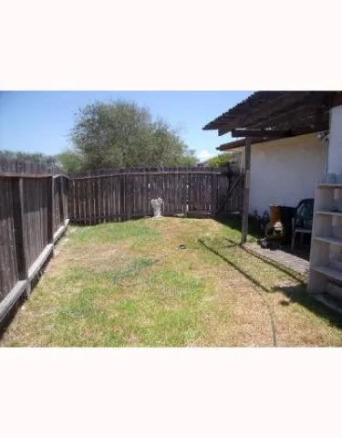 a view of swimming pool with a patio