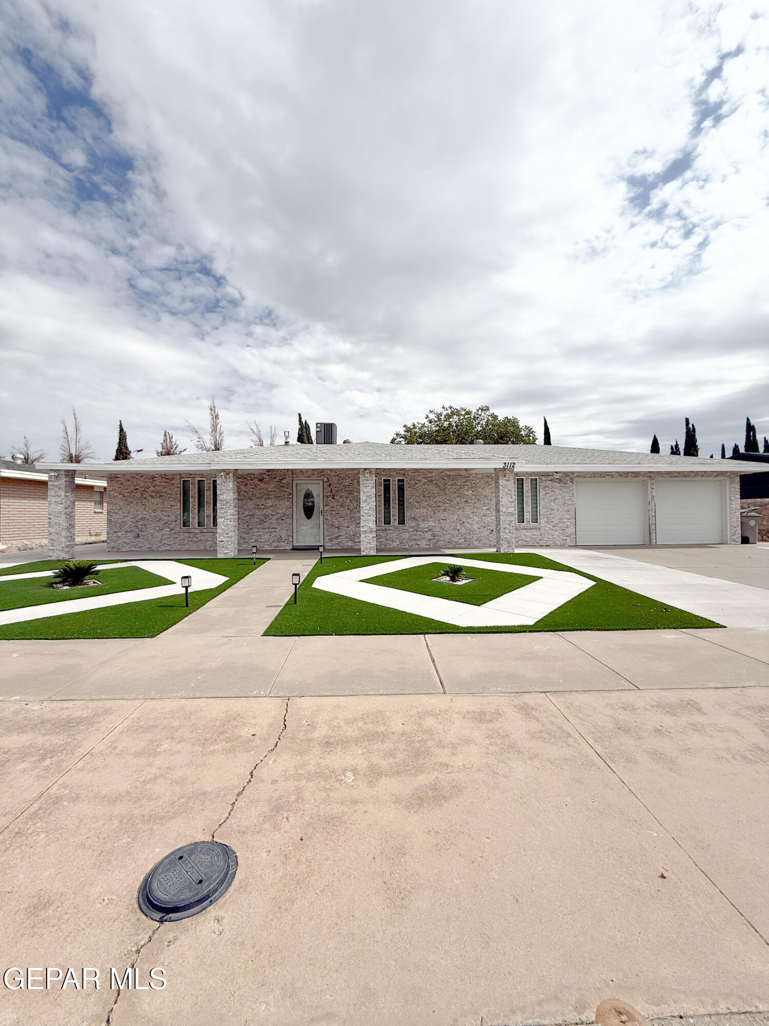 3112 Eads Place El Paso, TX 79935 - Photo 1 of 24 a view of a swimming pool with a yard