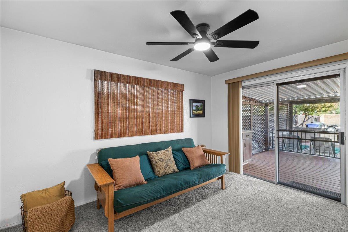 232 Fusco Avenue Modesto, CA 95354 - Photo 19 of 52 a living room with furniture and a large window