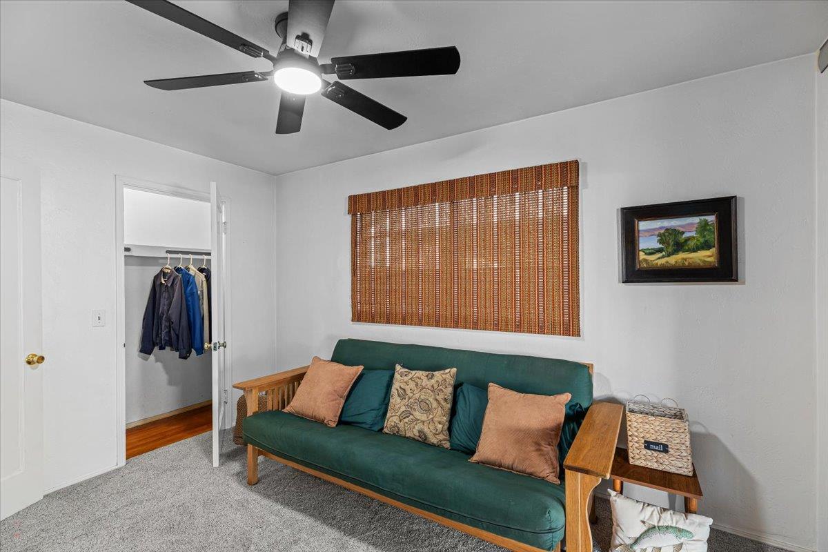 232 Fusco Avenue Modesto, CA 95354 - Photo 20 of 52 a living room with furniture and a window