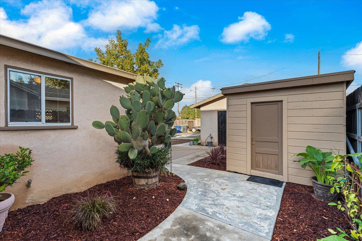 232 Fusco Avenue Modesto, CA 95354 - Photo 33 of 52 a view of a house with a yard