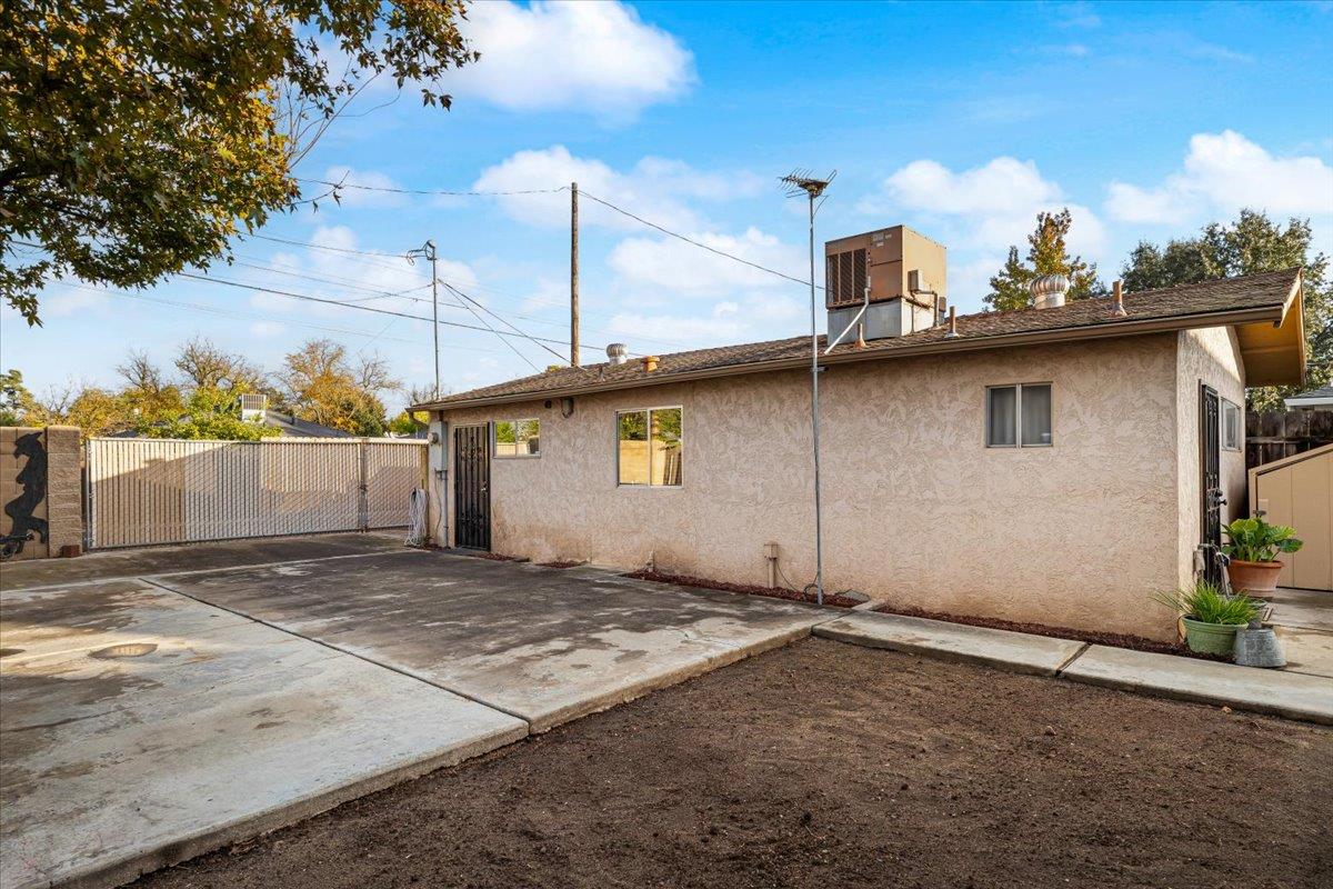 232 Fusco Avenue Modesto, CA 95354 - Photo 46 of 52 a front view of a house with a yard