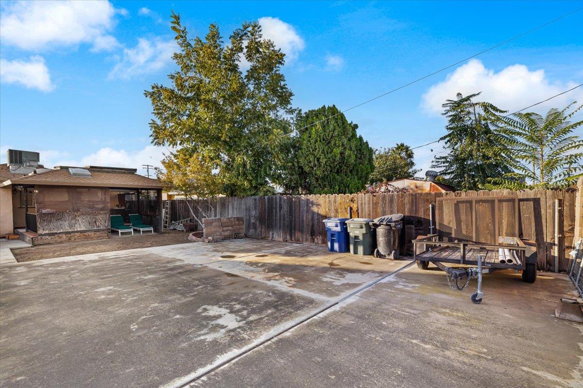 232 Fusco Avenue Modesto, CA 95354 - Photo 49 of 52 a view of a chairs and tables in patio