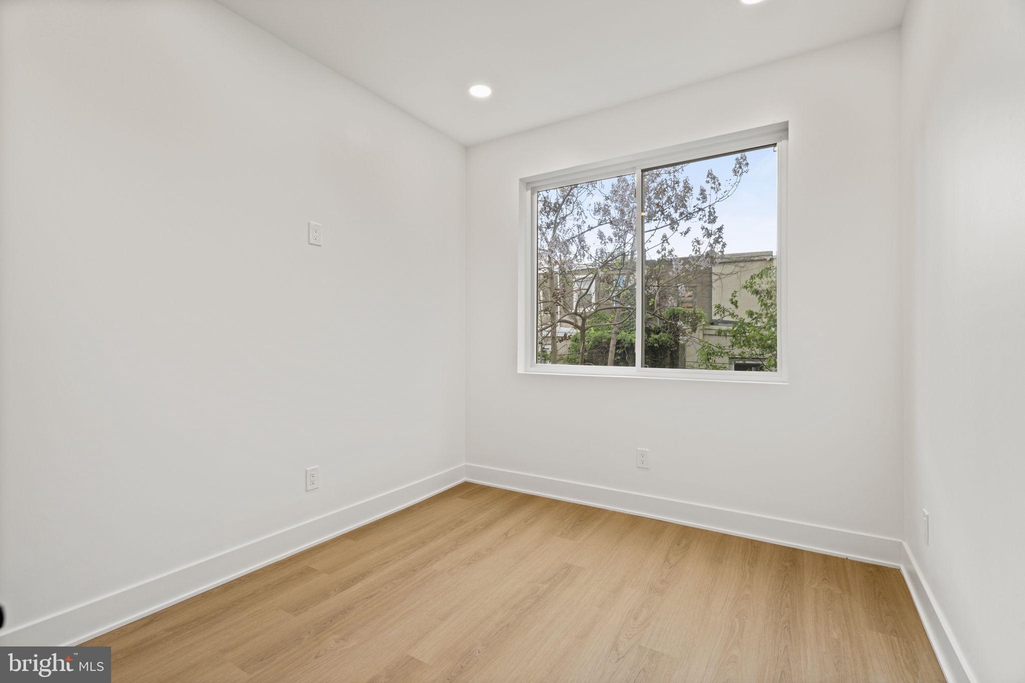 2410 Nicholas Street Philadelphia, PA 19121 - Photo 13 of 55 an empty room with a window