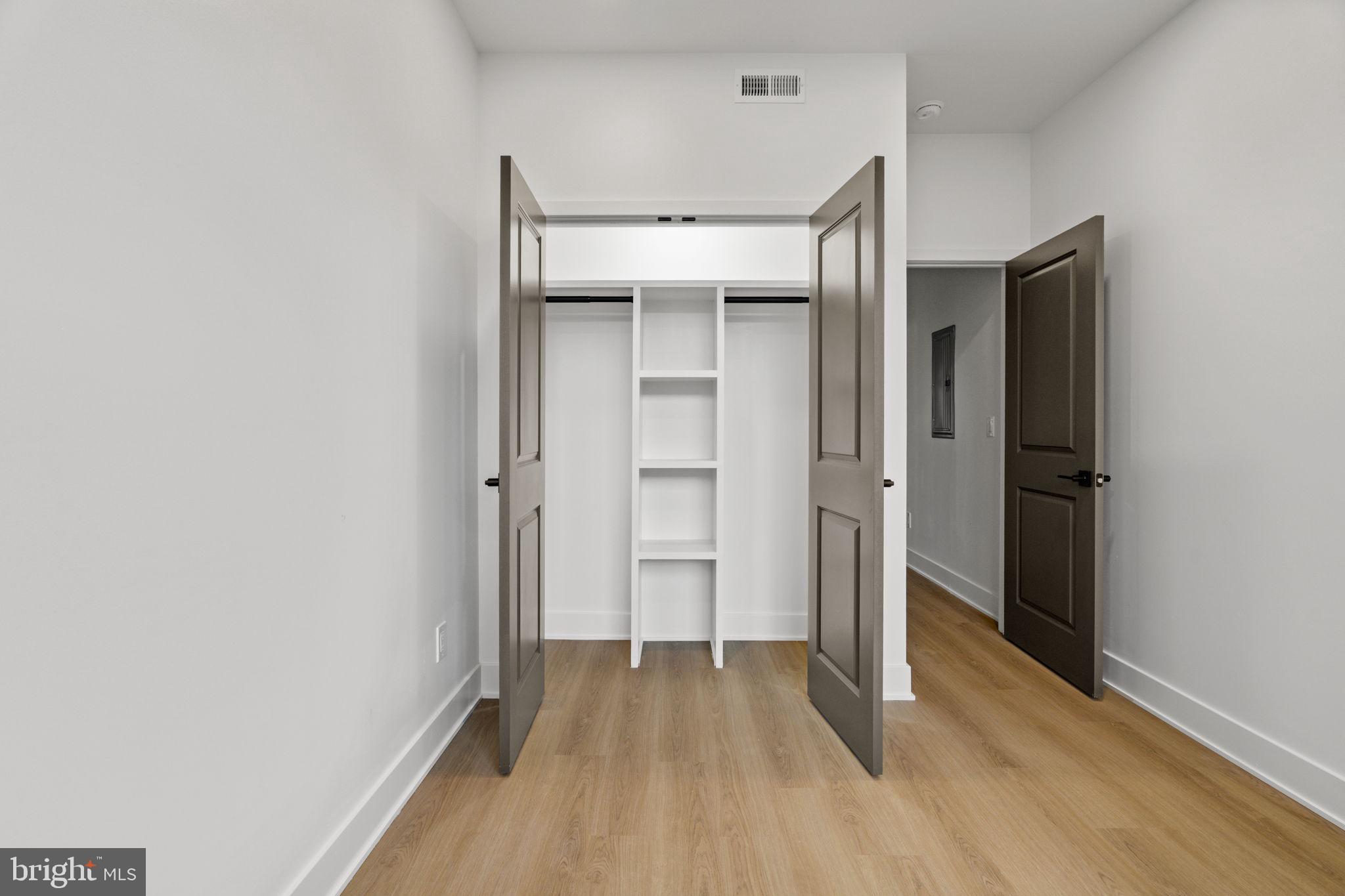 2410 Nicholas Street Philadelphia, PA 19121 - Photo 14 of 55 a view of an empty room with closet and a window