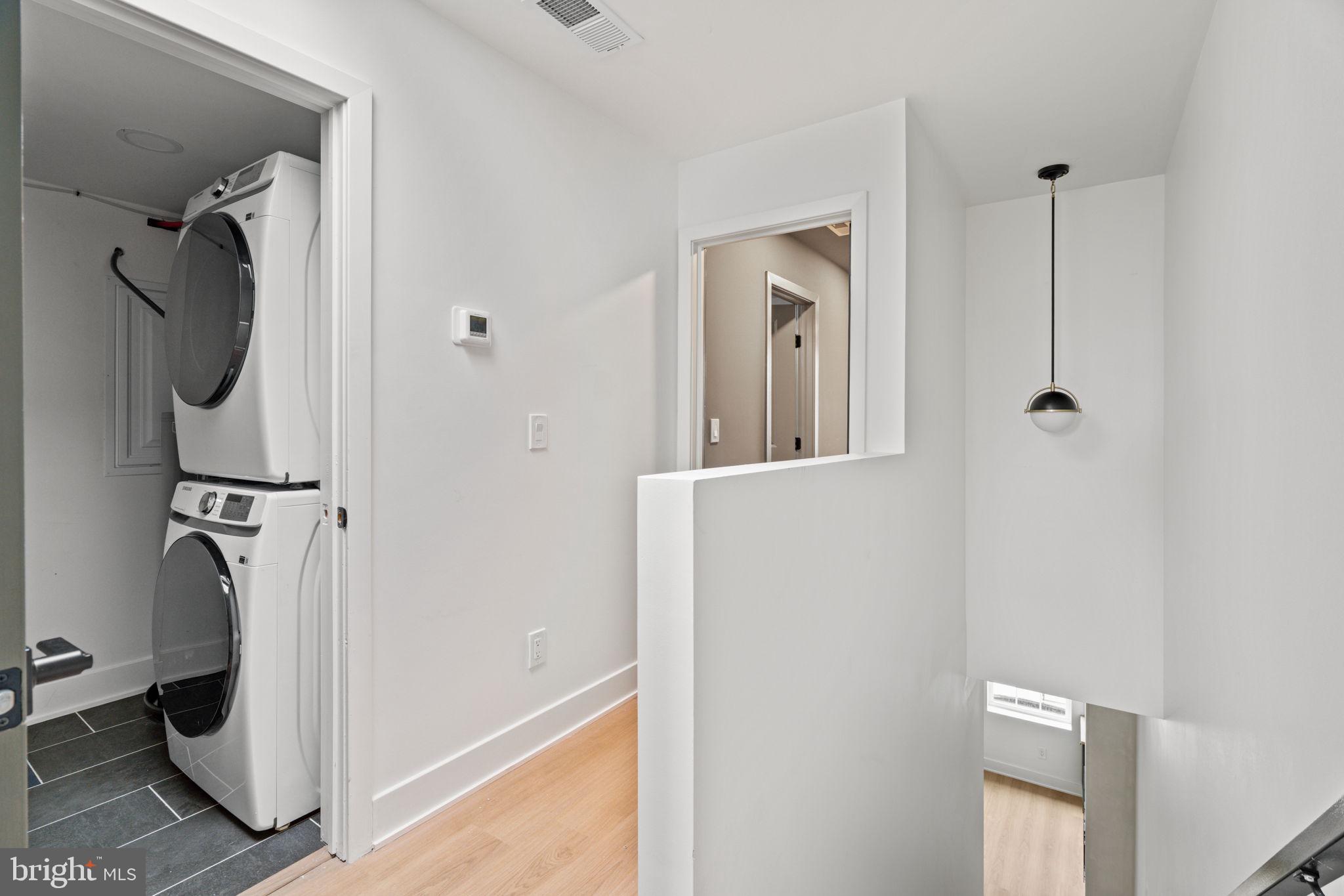 2410 Nicholas Street Philadelphia, PA 19121 - Photo 17 of 55 a view of a bathroom from a hallway