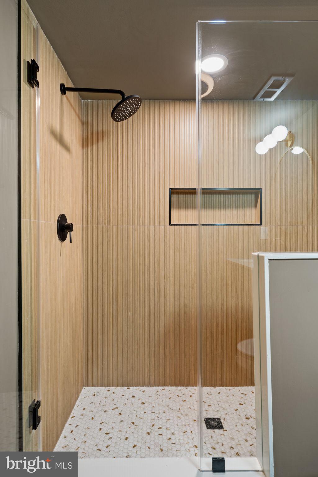 2410 Nicholas Street Philadelphia, PA 19121 - Photo 28 of 55 a bathroom with a shower and a sink