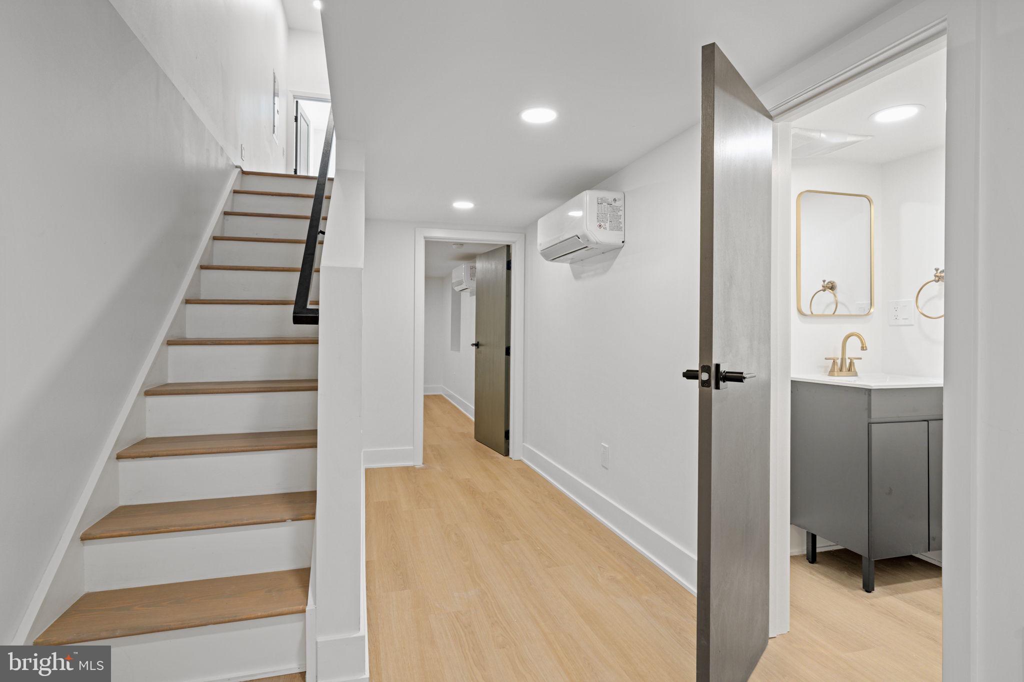 2410 Nicholas Street Philadelphia, PA 19121 - Photo 52 of 55 a view of a hallway with entryway and stairs